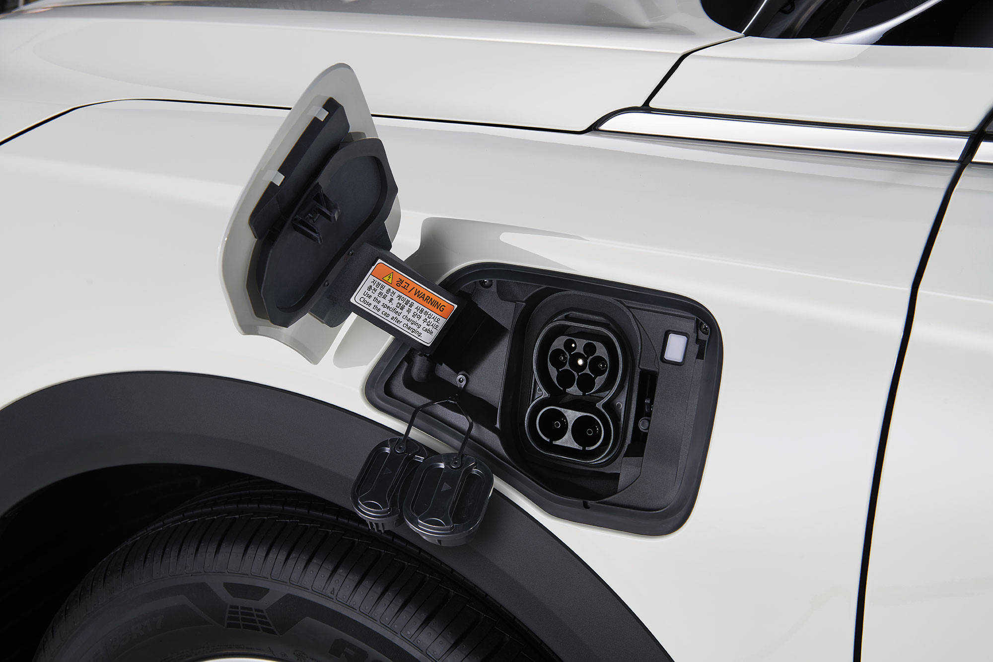 Charging door and ports